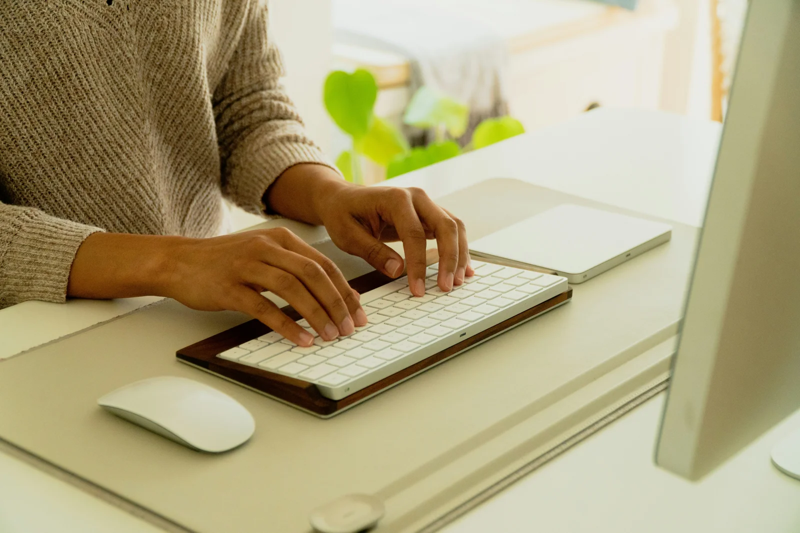 Person typing at keyboard